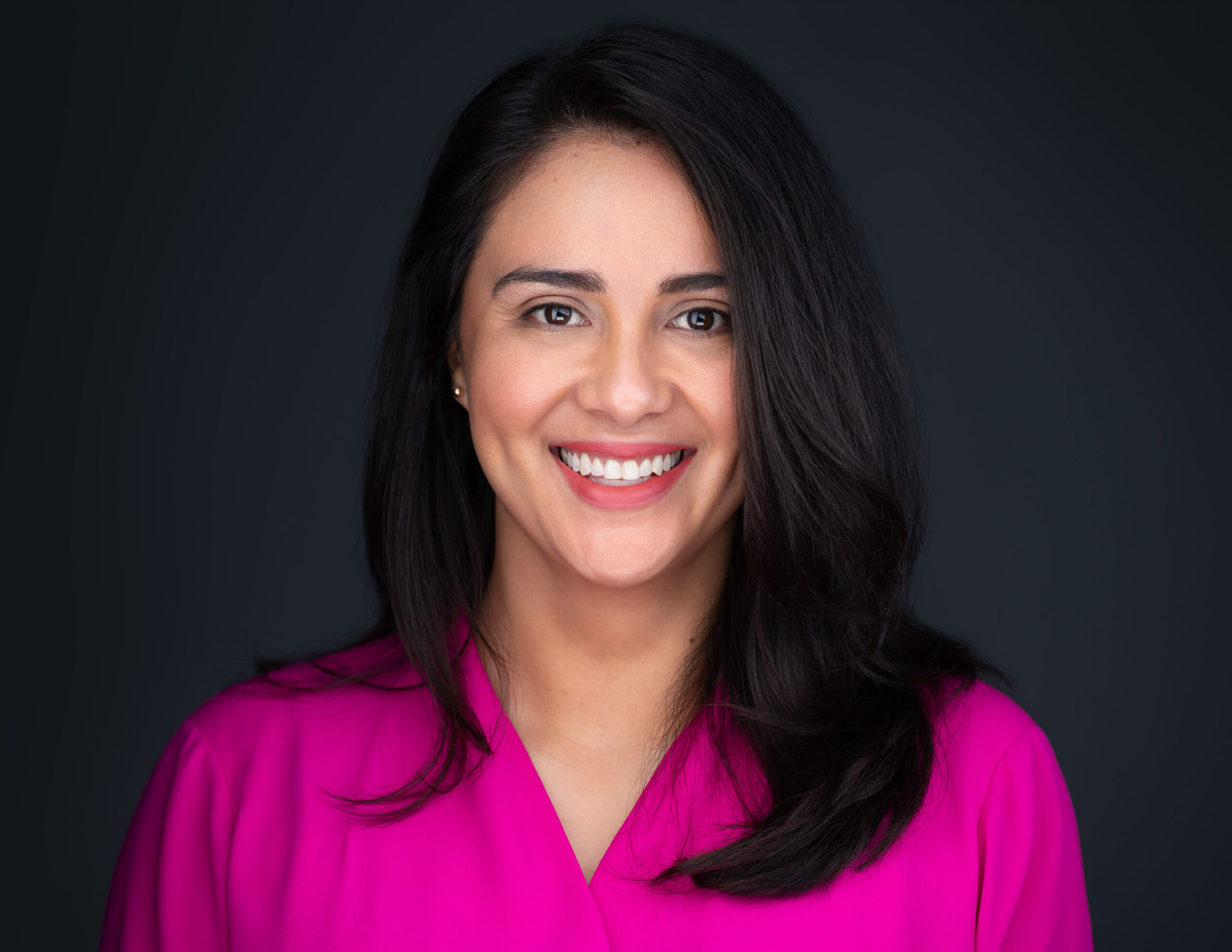 Vanessa Gallegos in Boca Raton supporting Breast Cancer Awareness Month, promoting early detection and community health events.