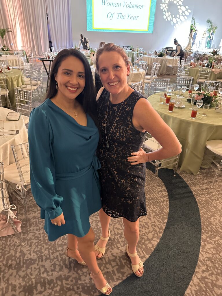 Vanessa Gallegos with nominees and guests at the Woman Volunteer of the Year event.