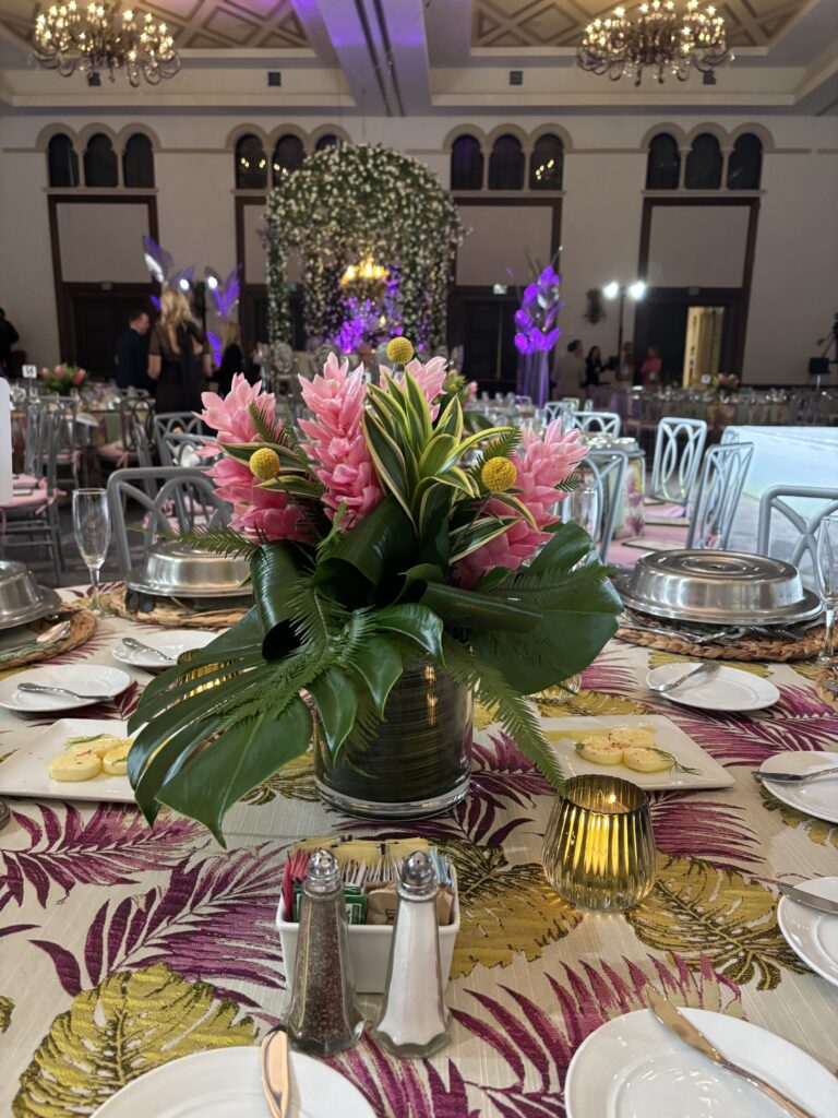 Event tables decorated with florals at the Junior League of Boca Raton’s Woman Volunteer of the Year Luncheon.