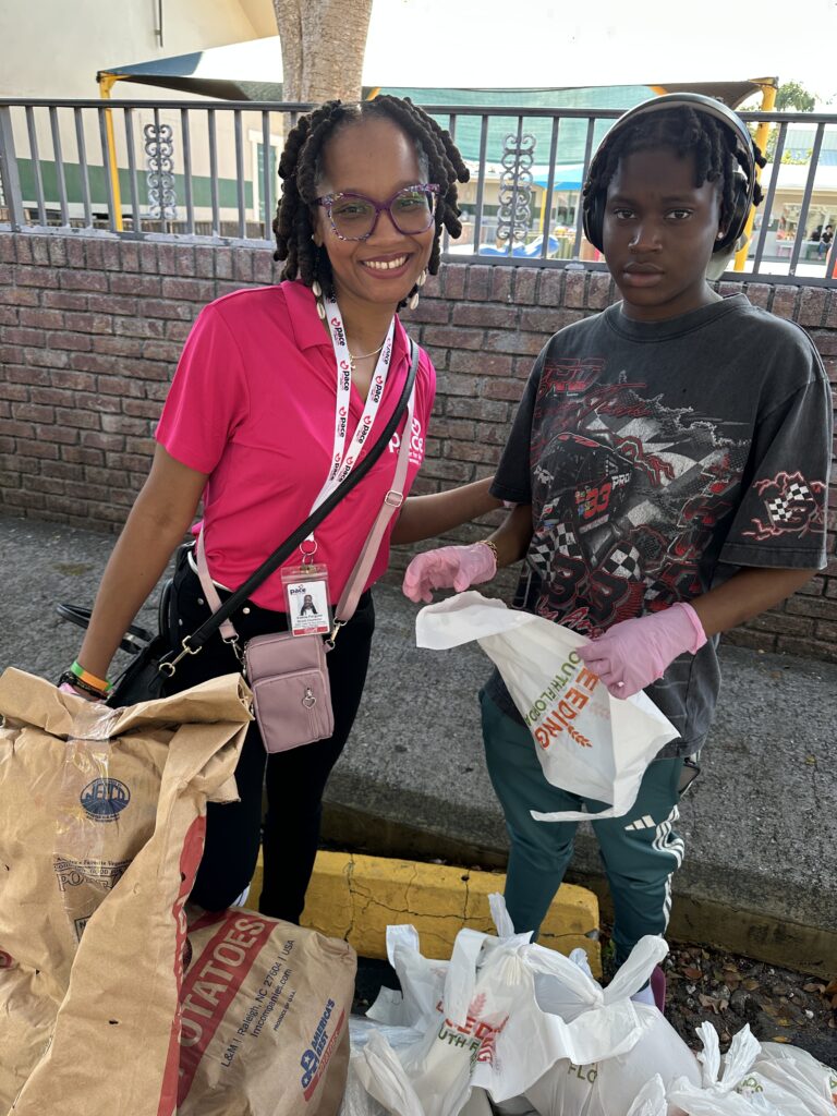 Feeding South Florida staff and volunteers distributing turkeys and food boxes during the holiday event.