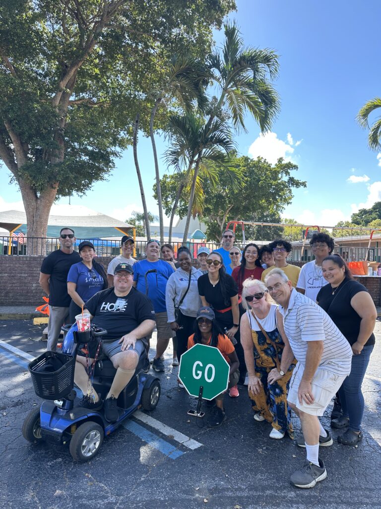 Volunteers distributing Thanksgiving meals at Nina’s Place with the Vanessa Gallegos Florida Project.